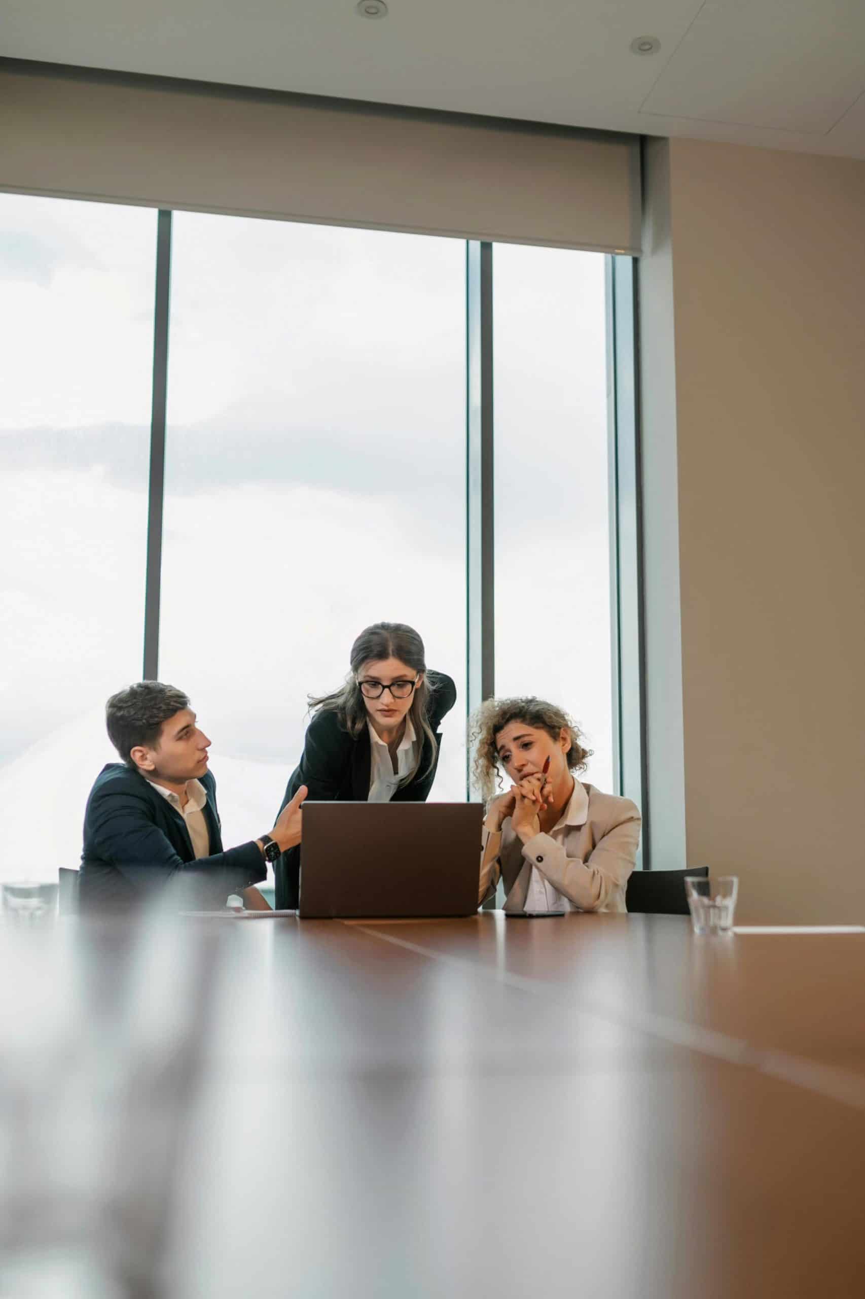 HOA management professionals reviewing community plans during a meeting in Billings, Montana.